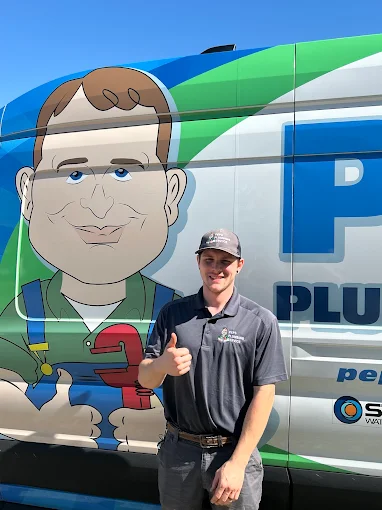 Peps technician beside a service van