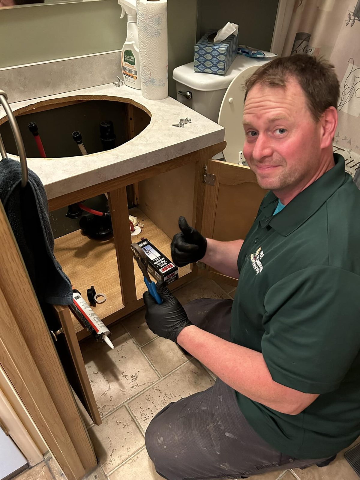 Peps Plumbing technician working on a home water line